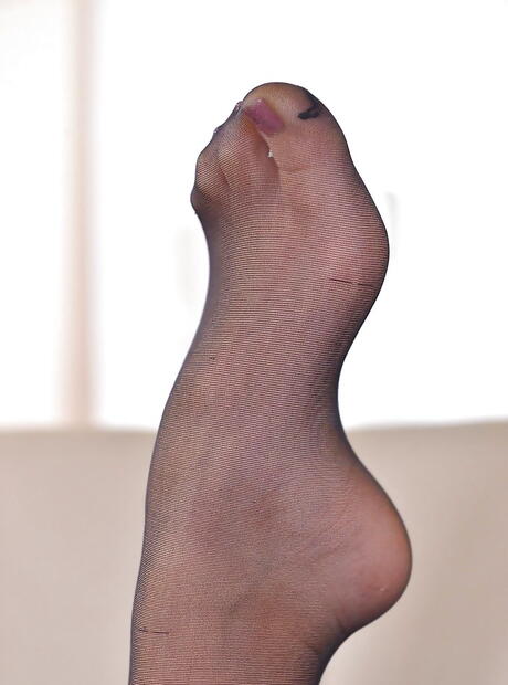 Slender russian blond teen Arteya in hot undies makes some foot fetish 