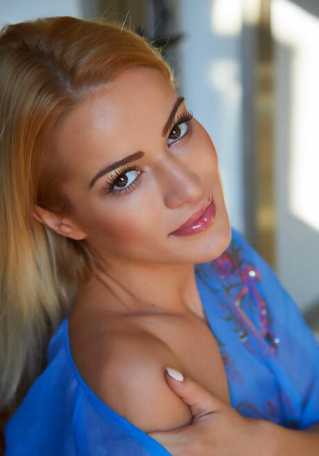 Slim british blonde Cherry Kiss uncovers small tits and spreads her legs 